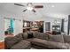 Spacious living room showcasing hardwood floors, comfortable seating, and seamless kitchen access at 1774 Timmons Marie Ln, Lincolnton, NC 28092