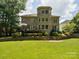 Expansive backyard with lush lawn and mature landscaping, perfect for outdoor activities at 2103 Lytton Ln, Matthews, NC 28104