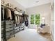 Spacious walk-in closet with custom shelving and organization system, maximizing storage and style at 2103 Lytton Ln, Matthews, NC 28104
