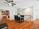 Bright dining area featuring hardwood floors, neutral walls, and stylish decor at 2103 Lytton Ln, Matthews, NC 28104