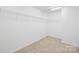 Walk-in closet featuring built-in shelving and plenty of storage space at 2316 Savannah Hills Dr, Matthews, NC 28105