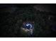 Stunning aerial view of the home at night showcasing outdoor lighting and the pool at 2418 Shuford Rd, Lincolnton, NC 28092