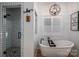 Elegant bathroom with a freestanding tub, walk-in shower, and modern fixtures at 2418 Shuford Rd, Lincolnton, NC 28092