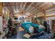 Spacious garage with a vintage car and ample storage for tools and equipment at 2418 Shuford Rd, Lincolnton, NC 28092