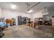 Spacious garage with ample storage cabinets and room for multiple cars at 2418 Shuford Rd, Lincolnton, NC 28092