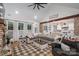 Spacious living room with vaulted ceiling, brick fireplace and open floor plan to kitchen at 2418 Shuford Rd, Lincolnton, NC 28092