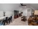 Open living area featuring comfortable seating, a TV, and neutral decor, perfect for relaxation at 2418 Shuford Rd, Lincolnton, NC 28092