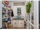 Walk-in pantry with ample shelving, storage cabinets and rustic wooden accents at 2418 Shuford Rd, Lincolnton, NC 28092