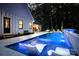 Backyard pool featuring illuminated fountains, in-pool seating, and a patio area perfect for relaxing and entertaining guests at 2418 Shuford Rd, Lincolnton, NC 28092