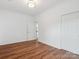Bedroom with hardwood floors and neutral walls at 2656 Polo Club Blvd, Matthews, NC 28105