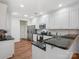 Modern kitchen with stainless steel appliances, granite countertops and white cabinets at 2656 Polo Club Blvd, Matthews, NC 28105