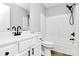This bathroom features a modern vanity with sleek hardware and a shower-tub combo at 3853 Carl Parmer Dr, Harrisburg, NC 28075