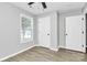 This bedroom provides ample natural light through a window and features two closets at 3853 Carl Parmer Dr, Harrisburg, NC 28075