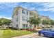 Inviting two-story condo boasts private balconies and lush landscaping in a tranquil community setting at 3853 Carl Parmer Dr, Harrisburg, NC 28075