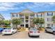 Apartment building with parking lot and blue sky at 3853 Carl Parmer Dr, Harrisburg, NC 28075