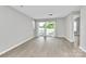 Bright living room with sliding glass doors, offering a seamless indoor-outdoor flow at 3853 Carl Parmer Dr, Harrisburg, NC 28075