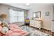 Bedroom with hardwood floors, and a window for lots of natural light at 3925 Rothwood Ln, Harrisburg, NC 28075