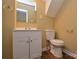 Bright bathroom featuring white vanity and modern toilet at 5008 Brooktree Dr, Charlotte, NC 28208