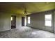 Spacious bedroom featuring a ceiling fan and windows for natural light at 551 Sylvan Sw St, Concord, NC 28025