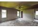 Comfortable bedroom featuring two windows, a ceiling fan, and a closet at 551 Sylvan Sw St, Concord, NC 28025