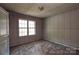 Bedroom featuring carpet and a large window at 551 Sylvan Sw St, Concord, NC 28025