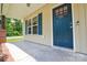 Inviting front door entrance with brick supports and blue shutters, offering a warm welcome at 551 Sylvan Sw St, Concord, NC 28025