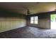 Bright living room showing natural light through a window and ceiling fan at 551 Sylvan Sw St, Concord, NC 28025