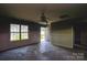 Inviting living room offering natural light and a glimpse of the outdoors at 551 Sylvan Sw St, Concord, NC 28025