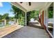 Back deck overlooking a serene lake, perfect for enjoying outdoor living and entertaining at 622 S Carolina Ave, Statesville, NC 28677