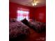 Bedroom with two beds and simple decor at 7333 Rosehall Dr, Charlotte, NC 28227