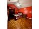 Bedroom with wood floors, ceiling fan, and closet at 7333 Rosehall Dr, Charlotte, NC 28227