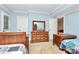Bedroom featuring wood furniture and neutral carpets at 8500 Peyton Randolph Dr, Charlotte, NC 28277