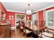Inviting dining room with hardwood floors, large windows, and classic furnishings at 8500 Peyton Randolph Dr, Charlotte, NC 28277