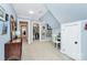 Hallway with a closet, a desk, and art pieces along the wall at 8500 Peyton Randolph Dr, Charlotte, NC 28277