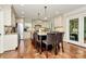 Spacious kitchen featuring a center island with barstool seating and modern appliances at 8500 Peyton Randolph Dr, Charlotte, NC 28277