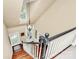View from the top of the staircase showing the front entry and the beautiful hardwood floors at 8500 Peyton Randolph Dr, Charlotte, NC 28277