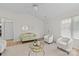 Open concept living room with neutral decor and lots of natural light at 9136 Four Mile Creek Rd, Charlotte, NC 28277