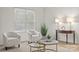 Bright living room featuring modern furniture, hardwood floors, and natural light at 9136 Four Mile Creek Rd, Charlotte, NC 28277