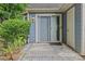 Private outdoor patio with sliding door entry and extra storage entrance, ideal for relaxing or entertaining at 9136 Four Mile Creek Rd, Charlotte, NC 28277