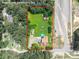 Aerial view of property boundary, outbuildings, lawn and surrounding foliage at 106 Guffey Rd, Cherryville, NC 28021