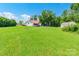 Sprawling backyard featuring green lawn, above ground pool, and outbuilding at 106 Guffey Rd, Cherryville, NC 28021