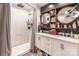 Modern bathroom featuring a walk-in shower, double vanity, and stylish fixtures at 106 Guffey Rd, Cherryville, NC 28021