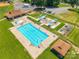 Aerial view of community pool, splash pad, picnic tables and buildings at 106 Guffey Rd, Cherryville, NC 28021