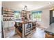 Well-appointed kitchen with a center island, open shelving, and modern appliances at 106 Guffey Rd, Cherryville, NC 28021