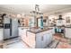 Spacious kitchen with a center island, stainless steel appliances, and stylish countertops and backsplash at 106 Guffey Rd, Cherryville, NC 28021