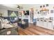 Cozy living room featuring hardwood floors, stylish furnishings, and a modern entertainment setup at 106 Guffey Rd, Cherryville, NC 28021