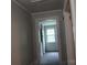 Hallway shot of an empty and simply designed hallway at 1146 Buffalo St, Shelby, NC 28150