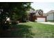 Charming brick two-story home with manicured lawn and attached two-car garage at 12520 Vantage Point Ln, Huntersville, NC 28078