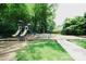 Community playground for residents includes swings, slides and picnic tables near by at 12520 Vantage Point Ln, Huntersville, NC 28078