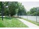 Community tennis court with a walking path, park bench and picnic table near by at 12520 Vantage Point Ln, Huntersville, NC 28078